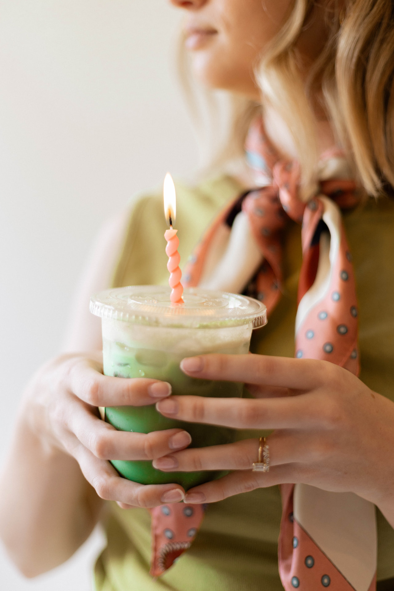 Birthday candle in a matcha latte